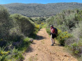 Descente de la route vers les dune de la plage de Tizzano