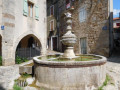 Fontaine sur la Place des Griffouls à Ceilhes-et-Rocozels