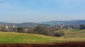 Vue sur Chenebier - Le temple à droite avec son clocher, l'Eglise en face.